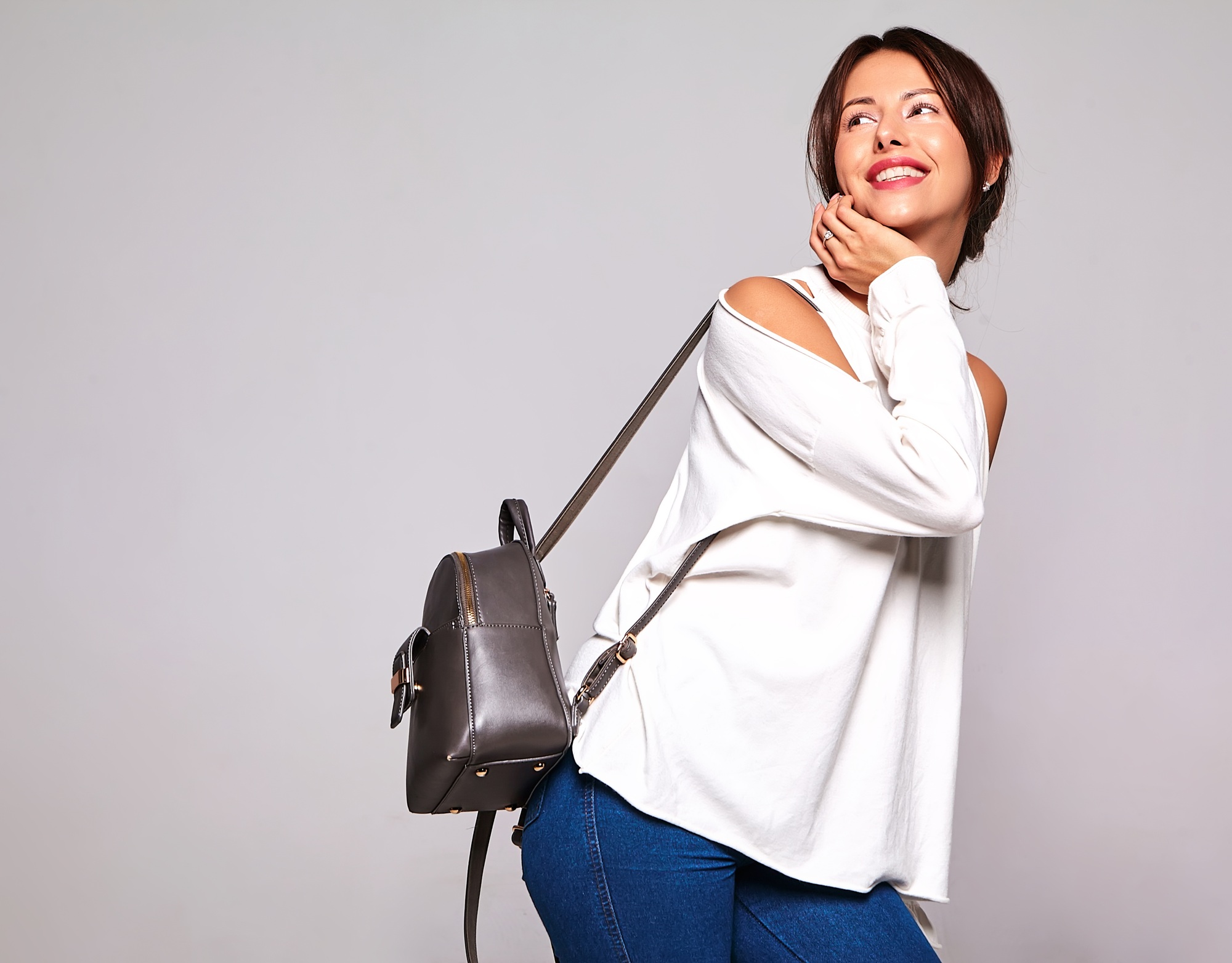 Beautiful stylish woman posing in studio